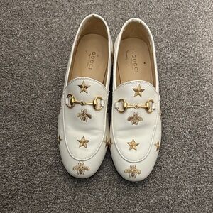 White Loafers with Gold Accents
